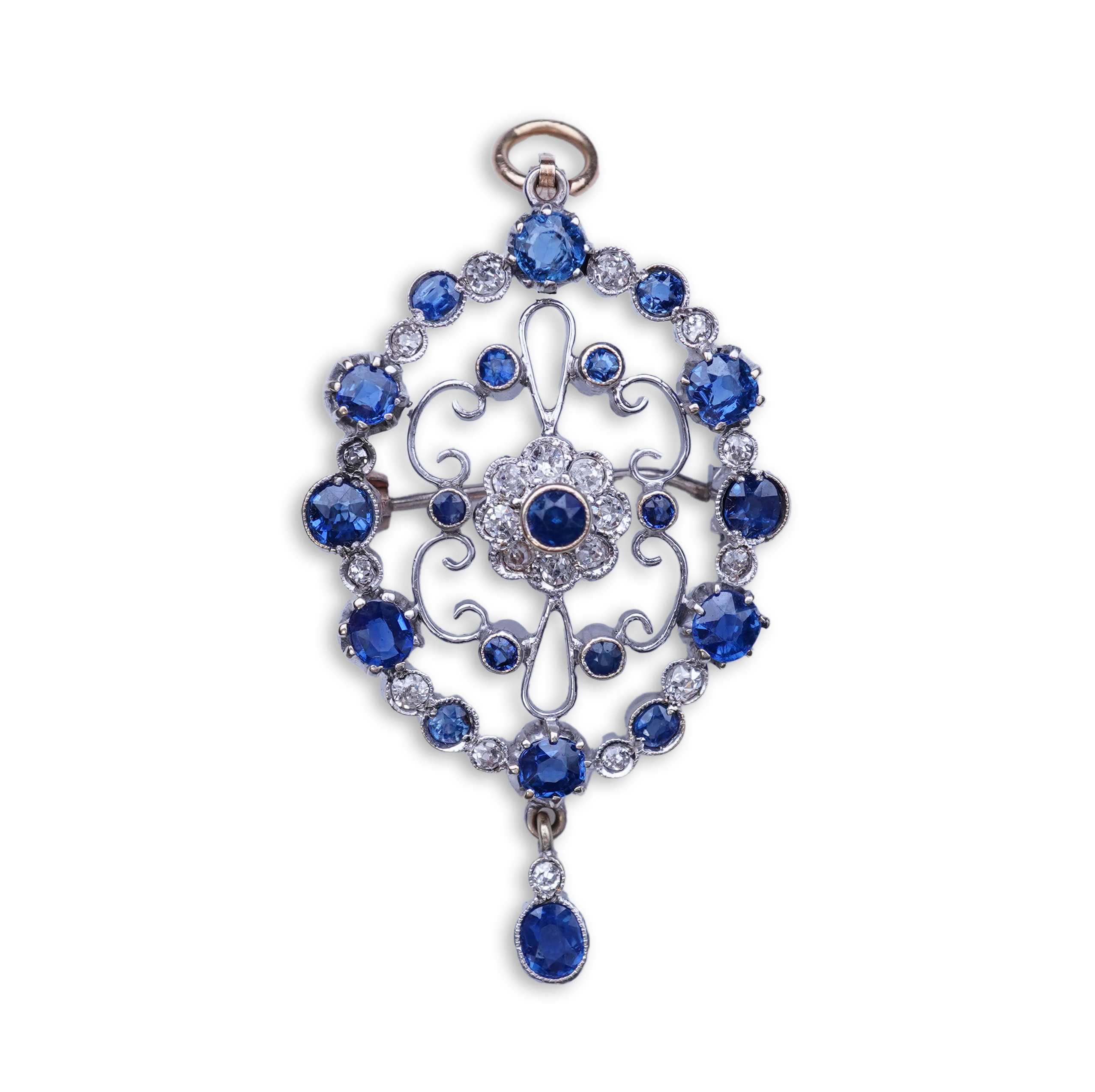 A sapphire and diamond brooch/pendant, mid 20th century